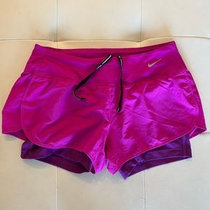 Pink/purple Nike running shorts Dri-Fit size Small. Like new. Worn maybe twice.